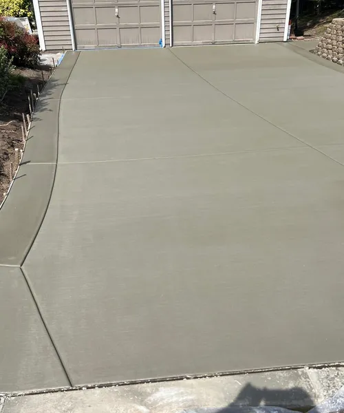 Broom Finish Driveway With Decorative Borders in Edmonds 